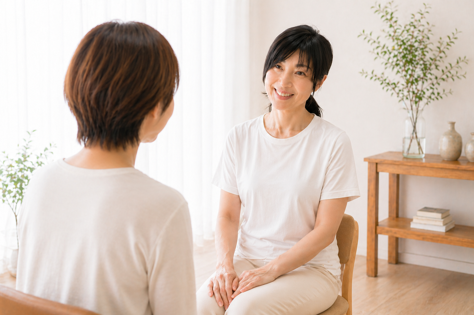 お客様と話す三浦美和